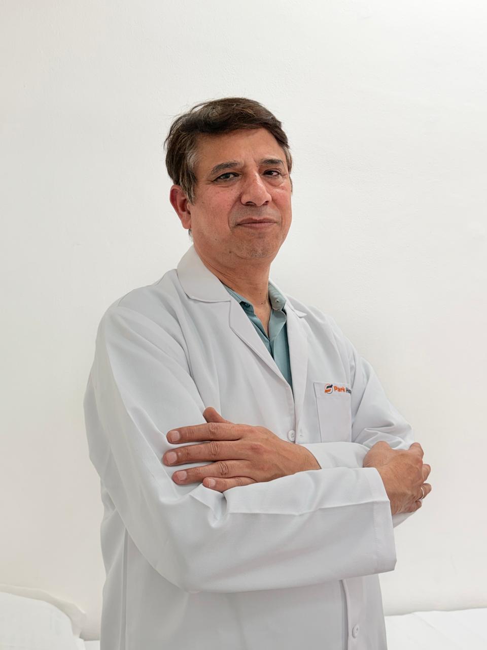 Dr. Dharmender Sharma